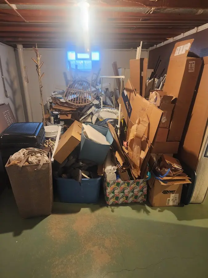 Roll-off dumpster container at job site for 4 Yard Dumpster Rental in Newton